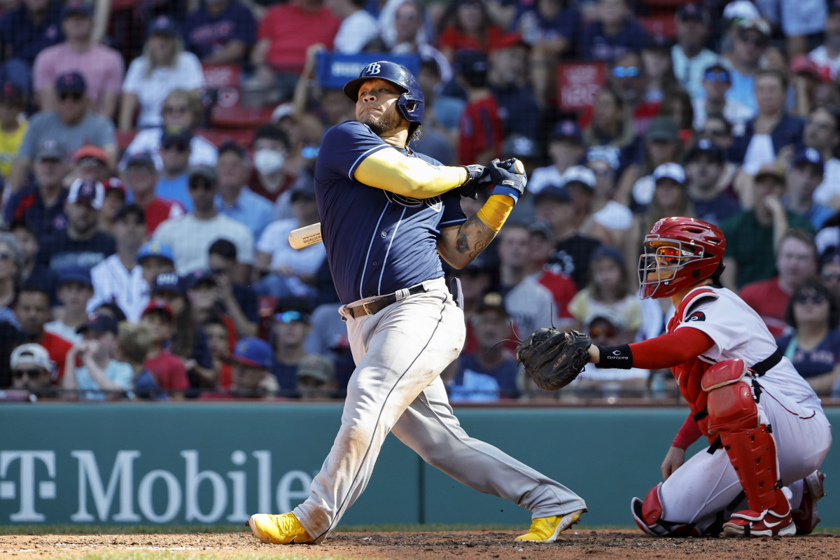 Aug 28, 2022; Boston, Massachusetts, USA; Tampa Bay Rays first baseman Harold Ramirez (43) follows through on an RBI single against the Boston Red Sox during the sixth inning at Fenway Park.